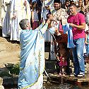 Света Литургија и саборно крштење Рома на Расини