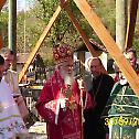 Bishop Milutin serves Liturgy in the church log cabin in the village of Planinica