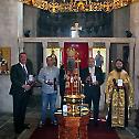 Епископ Јоаникије одликовао заслужне појединце Златном медаљом Светог Георгија