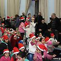 Patriarch of Jerusalem offers Christmas presents to children at St Demetrius nursery and primary school