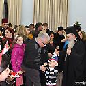 Patriarch of Jerusalem offers Christmas presents to children at St Demetrius nursery and primary school