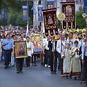 The relics of St Philotheia and a fragment of the Holy Cross carried in procession, in Bucharest