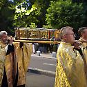 The relics of St Philotheia and a fragment of the Holy Cross carried in procession, in Bucharest
