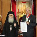 The Patriarch of Jerusalem awards The Ambassador of Hungary