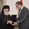 Alexandrian Patriarch Theodoros II awarded by President of Serbia Aleksandar Vucic with the order of Great Cross of Apostle Mark. A high state order handed in to Patriarch Theodoros II.