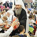 Met. Onuphry of Kiev visits, brings Christmas gifts to sick and orphaned children at monastery