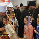 Met. Onuphry visits, greets orphans with Paschal joy
