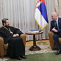 Metropolitan Hilarion visits Minister Popovic 