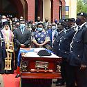 The late Elder Jonah of Kampala reposes in the embrace of Uganda