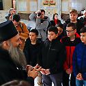 Patriarch with children from the region at Saint Sava Cathedral church