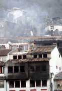 Burned Serb houses in the Potkaljaja quarter near the Prizren Seminary