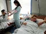  Serb women Slavka Kaliskic, 70, left, and her daughter Gordana, 42, recover in the hospital of the Serb village of Laplje Selo, some 10 miles from Kosovo's capital Pristina from wounds they received when attacked by ethnic Albanian mobs, Tuesday, March 23, 2004. The two women, like many Serbs hurt in the violence of last week, say they plan to start a new life outside the province once they recover. (AP Photo: FoNet)