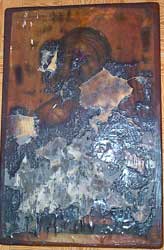 Hristova ikona u crkvi Sv. Nikole u Kosovu Polju - crkva je iznutra zapaljena i demolirana